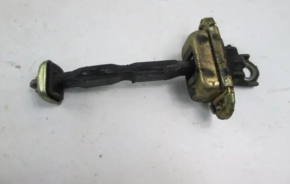 Rear door check strap stopper