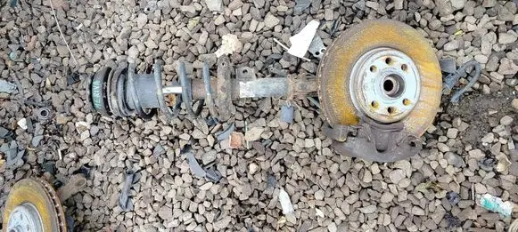 Front shock absorber with coil spring