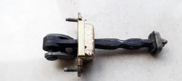 Ford Mondeo MK II Rear door check strap stopper