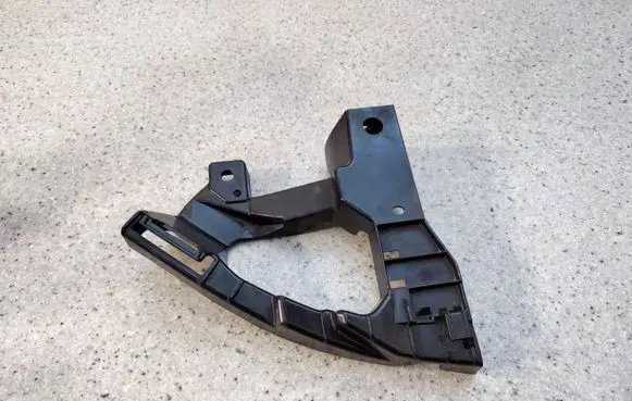Front bumper mounting bracket