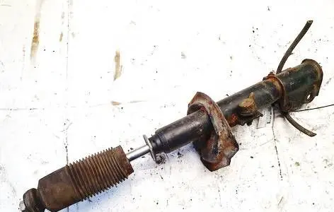 Suzuki Swift I Front shock absorber/damper 333408