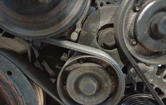Opel Meriva A Generator/alternator belt tensioner