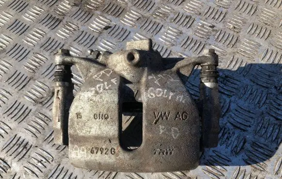 Volkswagen Golf VII Front brake caliper
