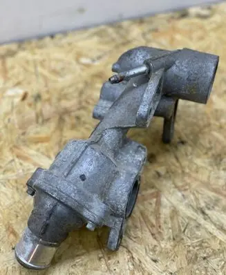Thermostat/thermostat housing