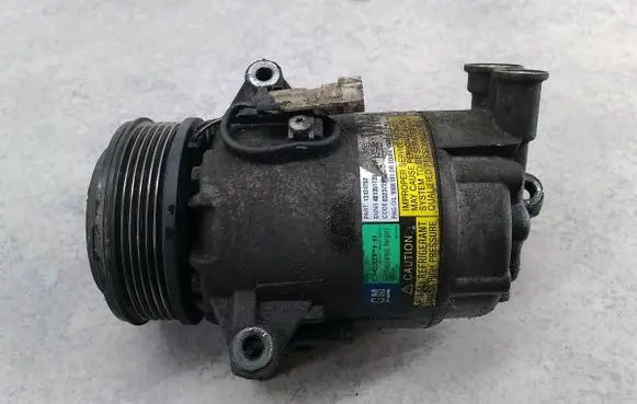 Opel Zafira B Air conditioning (A/C) compressor (pump) 13124752