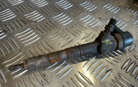 Opel Astra J Fuel injector 0445110327