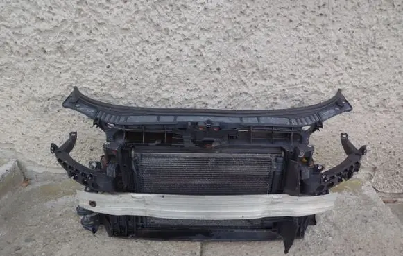 Top upper radiator support slam panel