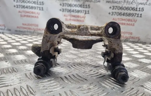 Volkswagen Touran I Brake caliper pad carrier rear 