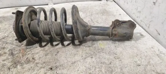 Front shock absorber with coil spring