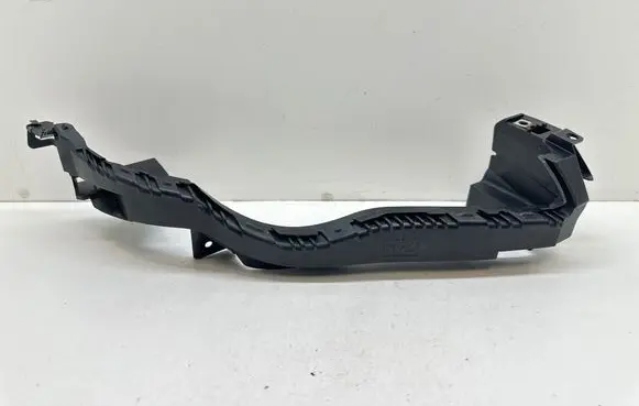 Subaru Legacy Headlight/headlamp mounting bracket 