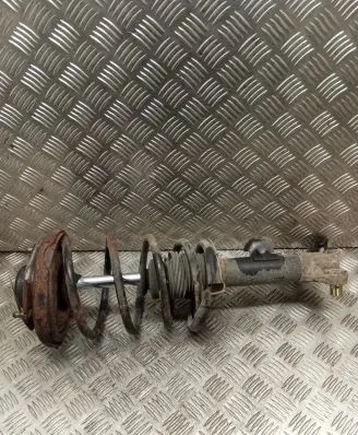 Nissan Primera Front shock absorber with coil spring