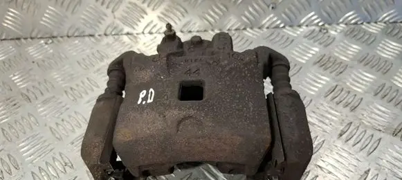 Nissan Juke I F15 Front brake caliper