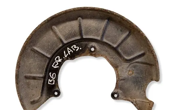 Volkswagen PASSAT B6 Front brake disc dust cover plate 1K0615312F