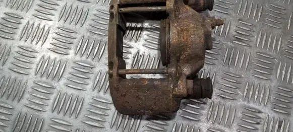 Mazda 323 F Front brake caliper