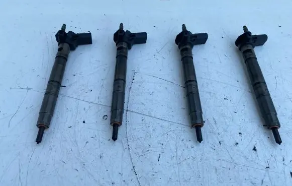Volkswagen Tiguan Fuel injectors set 03L130277 0445116