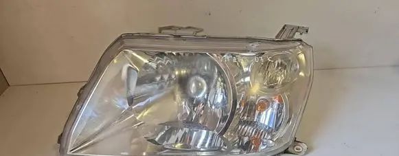 Suzuki Grand Vitara II Headlight/headlamp 10059076