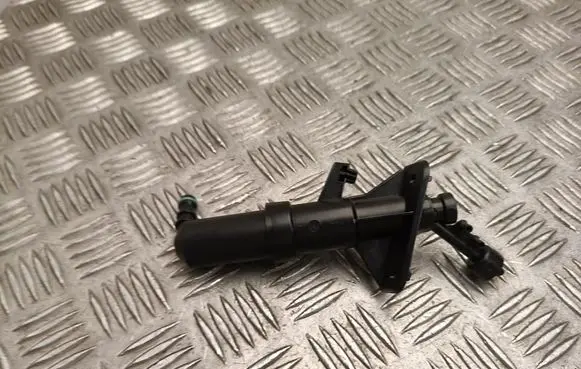 Volkswagen PASSAT CC Headlight washer spray nozzle AT50100