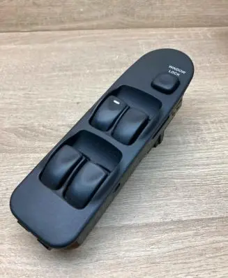 Mitsubishi Carisma Electric window control switch MR740599