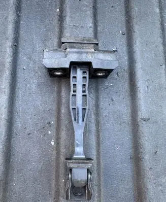 Rear door check strap stopper