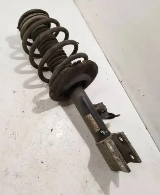 Front shock absorber with coil spring