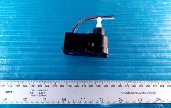 Volkswagen Golf IV Headlight level adjustment motor 0307853304