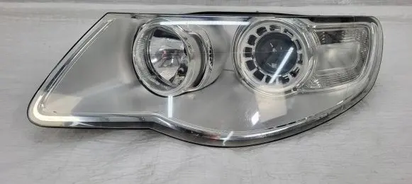 Volkswagen Touareg I Headlight/headlamp 1EL24703201 941031 703201000048