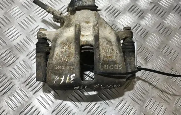 Volkswagen Golf III Front brake caliper