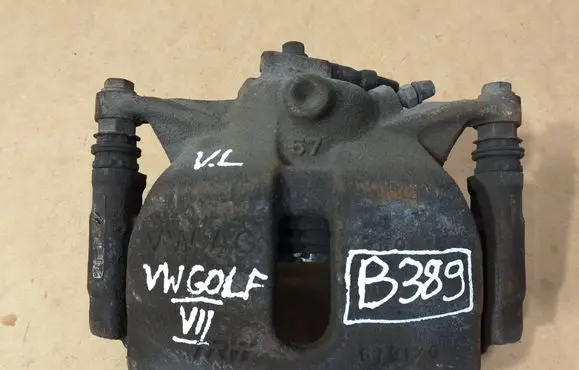 Volkswagen Golf VII Front brake caliper 6791G