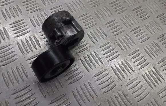 Opel Zafira B Alternator belt tensioner pulley 