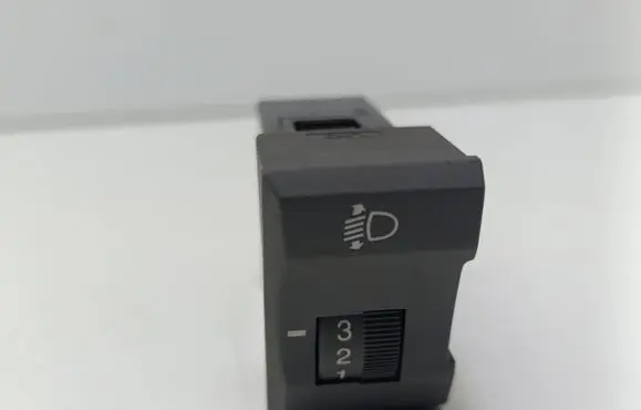 KIA Carens I Headlight level height control switch 