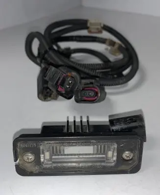 Volkswagen Golf V Number plate light 6H0971921C 1J6943021B