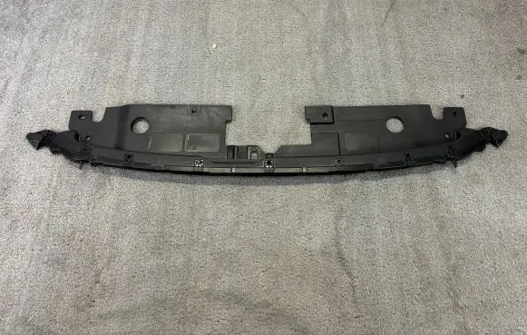 Engine bonnet/hood lock trim molding