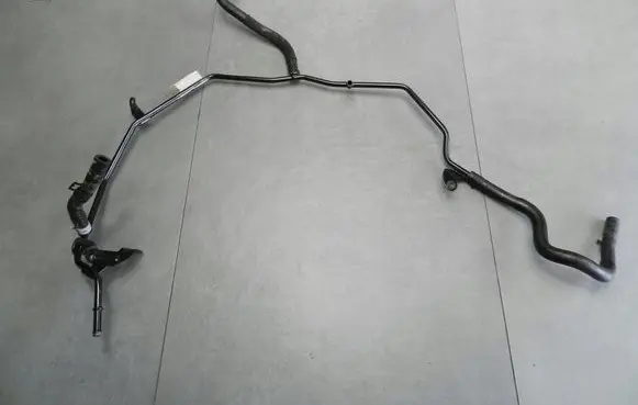 Volkswagen Golf VII Engine coolant pipe/hose 06K121075Q
