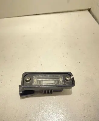 Volkswagen PASSAT B6 Number plate light 1J6943021B
