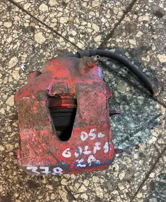 Volkswagen Golf V Front brake caliper