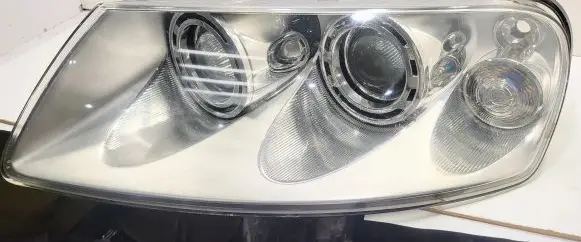 Volkswagen Touareg I Headlight/headlamp 7L6941015BK