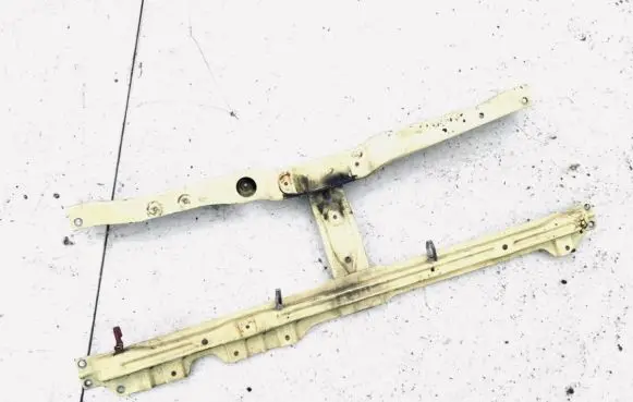 Radiator support slam panel