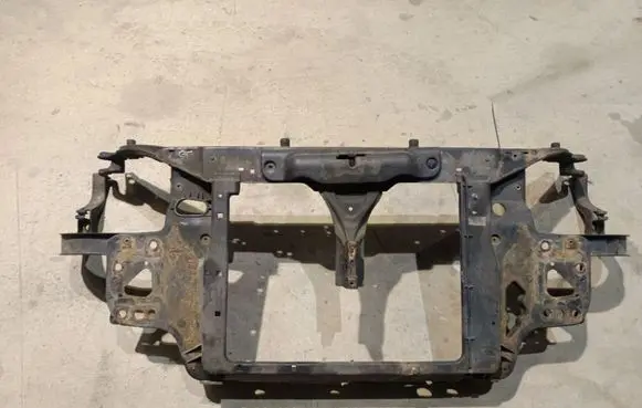 Radiator support slam panel