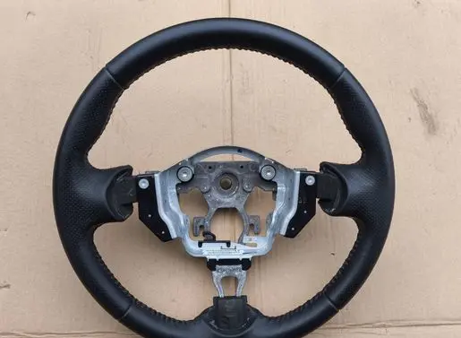 Nissan Juke I F15 Steering wheel 34127617B 484301KB1A