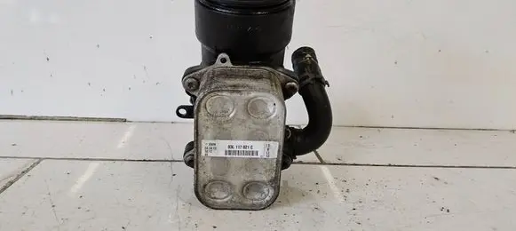 Volkswagen Jetta VI Oil filter mounting bracket 03L115389C 29042013383