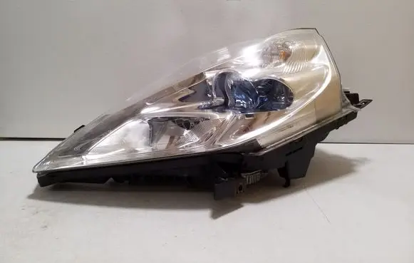Nissan Leaf I (ZE0) Headlight/headlamp 260603NM5A A1M1300000