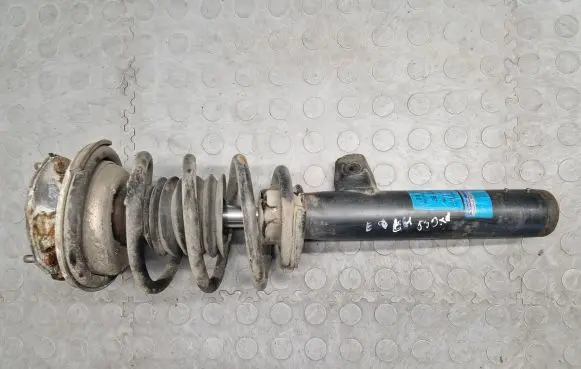 Front shock absorber with coil spring