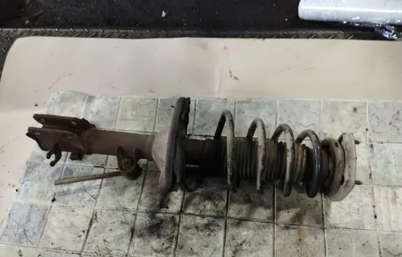 KIA Sportage Rear shock absorber with coil spring 