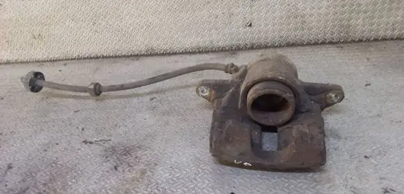 Peugeot 208 I Front brake caliper 