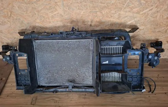 Radiator support slam panel