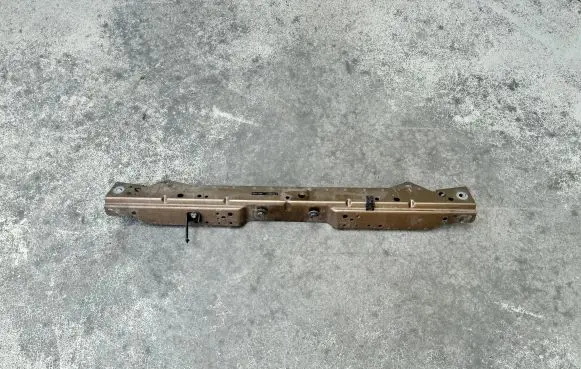 Top upper radiator support slam panel