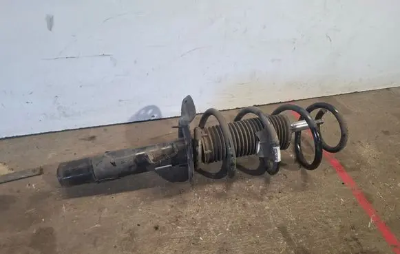 Volvo V60 Front shock absorber with coil spring 31406001