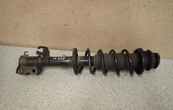 Nissan Note (E12) Front shock absorber with coil spring
