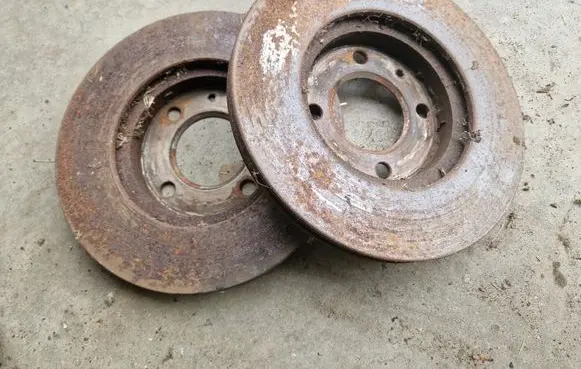 Volkswagen Golf I Front brake disc 321615301C JZW615301K