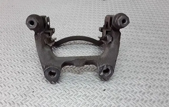 Volkswagen PASSAT B6 Brake caliper pad carrier rear 
